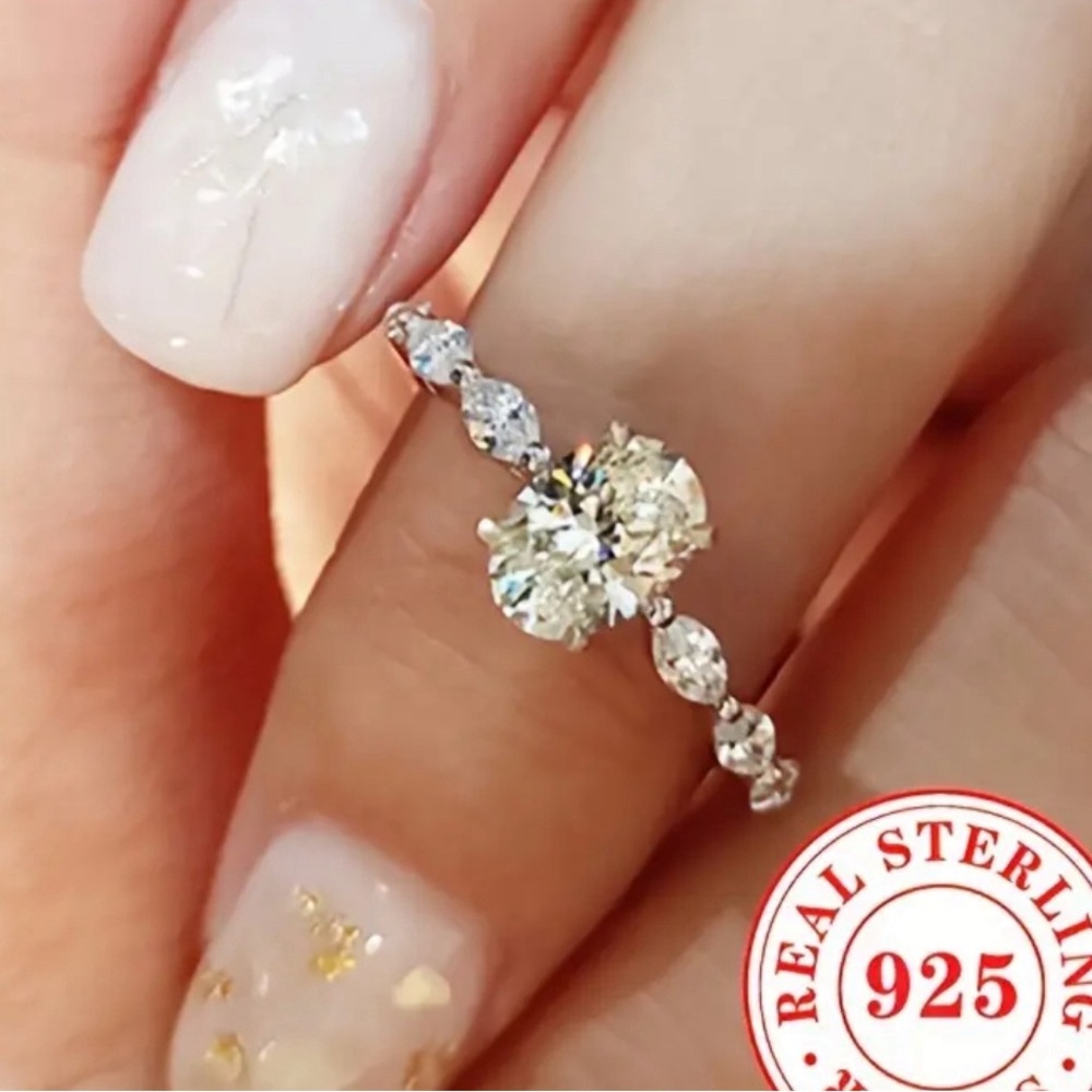 Beautiful oval engagement ring- great travel ring- great reviews! Truly stunning